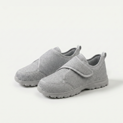 Scarpe ortopediche in tessuto grigio con cinturino a strappo e suola spessa