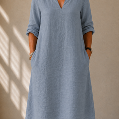 Light blue V-neck midi dress with 3/4 sleeves and relaxed loose fit