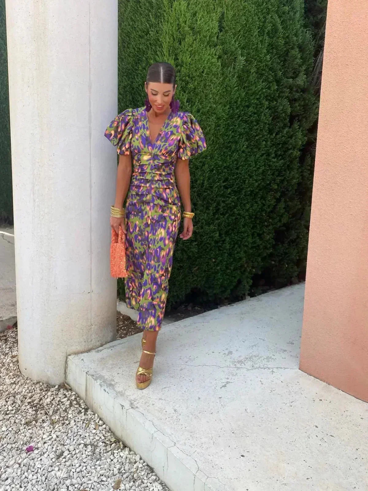 Abstract print midi dress with V-neck and puff sleeves, gathered waist, side view