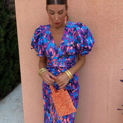 Blue/pink animal-print puff-sleeve V-neck midi dress, tied waist, sequin mini bag