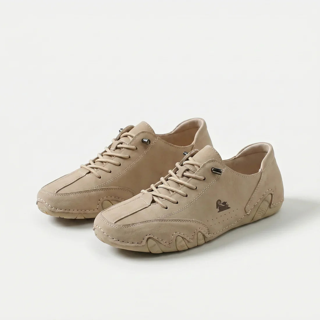 Scarpe ortopediche con lacci, tomaia beige e suola sagomata ammortizzata