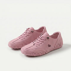 Scarpe ortopediche con lacci, tomaia rosa e suola sagomata ammortizzata