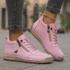 Scarpe ortopediche comode rosa con lacci e cerniera laterale, suola in corda