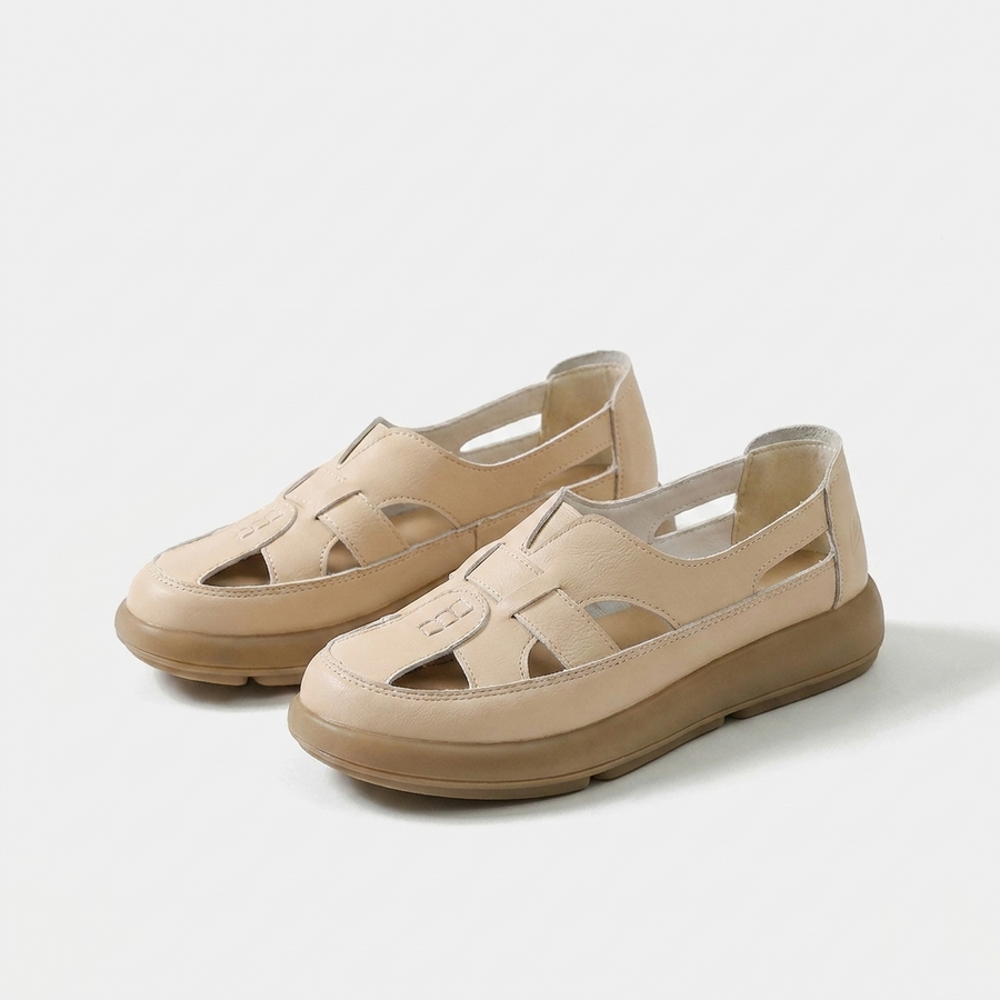 Sandali platform beige con cinturini intrecciati e suola rialzata