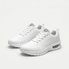 Scarpe ortopediche bianche con lacci e suola ammortizzata, vista laterale