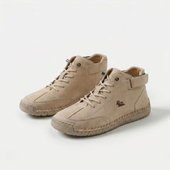 Sneaker alte beige con lacci e cinturino, dettaglio logo e suola spessa