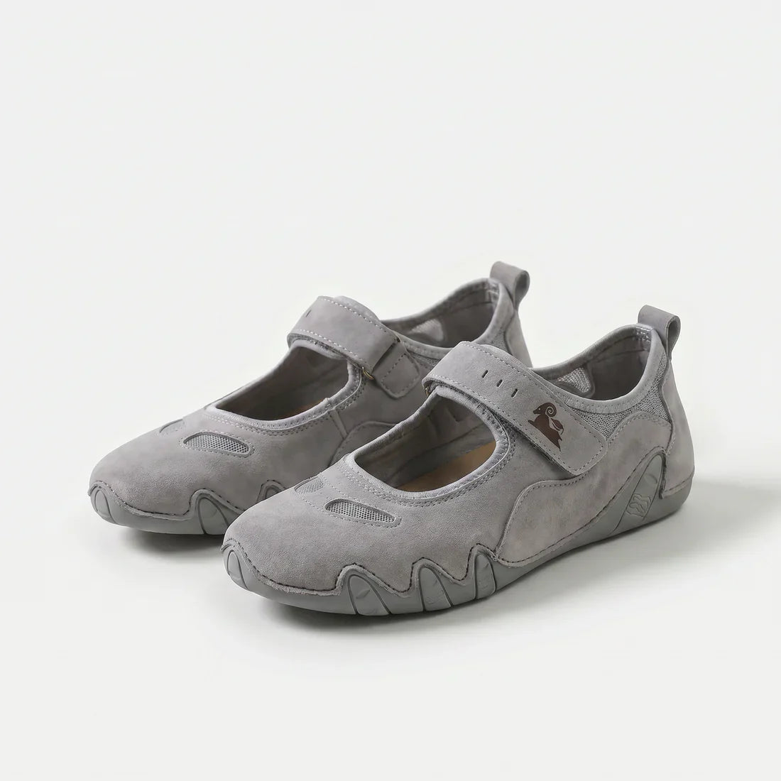 Ballerine comfort grigie con cinturino a strappo e suola flessibile, profilo ondulato