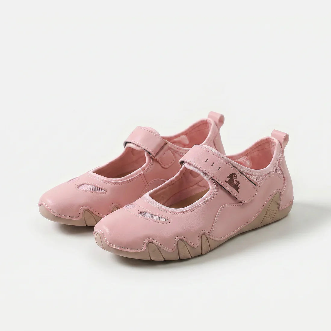 Ballerine rosa con cinturino a strappo, suola flessibile e tomaia traforata