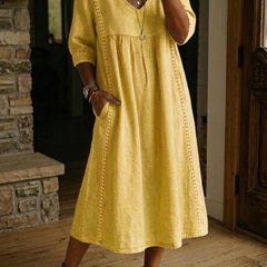 Abito maxi linea A giallo con scollo a V e maniche a 3/4