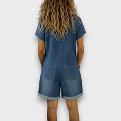 Denim-look short overalls in blue, back view with two patch pockets at waist