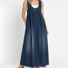 Blue denim maxi sundress with wide shoulder straps, center button placket and pockets