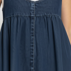 Blue denim sleeveless yoke with topstitching and gathered skirt section