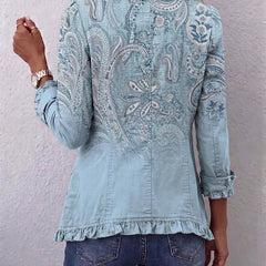 Sky blue paisley print jacket, back view with ruffled hem and gathered cuffs