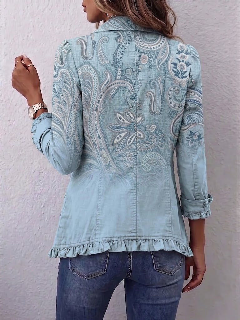 Sky blue paisley print jacket, back view with ruffled hem and gathered cuffs