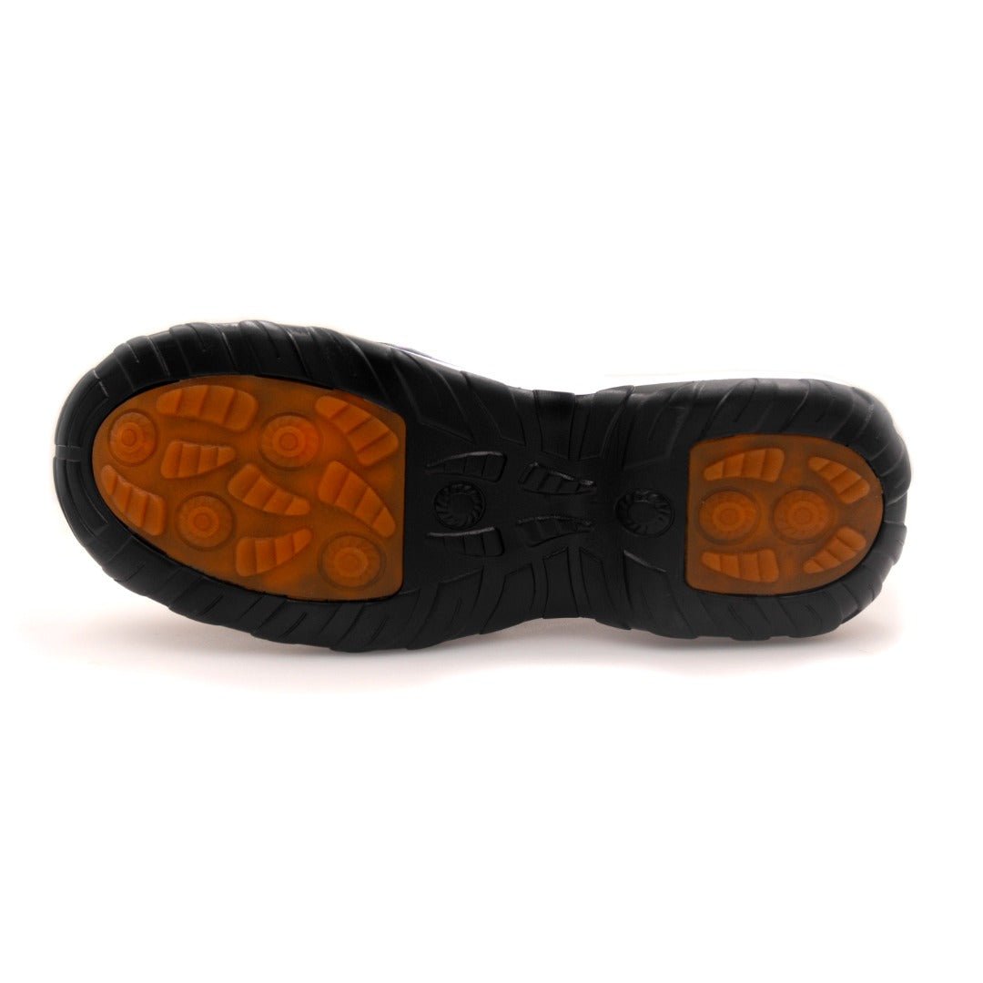 Scarpa comfort ortopedica: vista suola nera con inserti arancioni.
