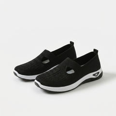 Scarpe ortopediche ammortizzanti slip-on nere in tessuto traforato con suola bianca