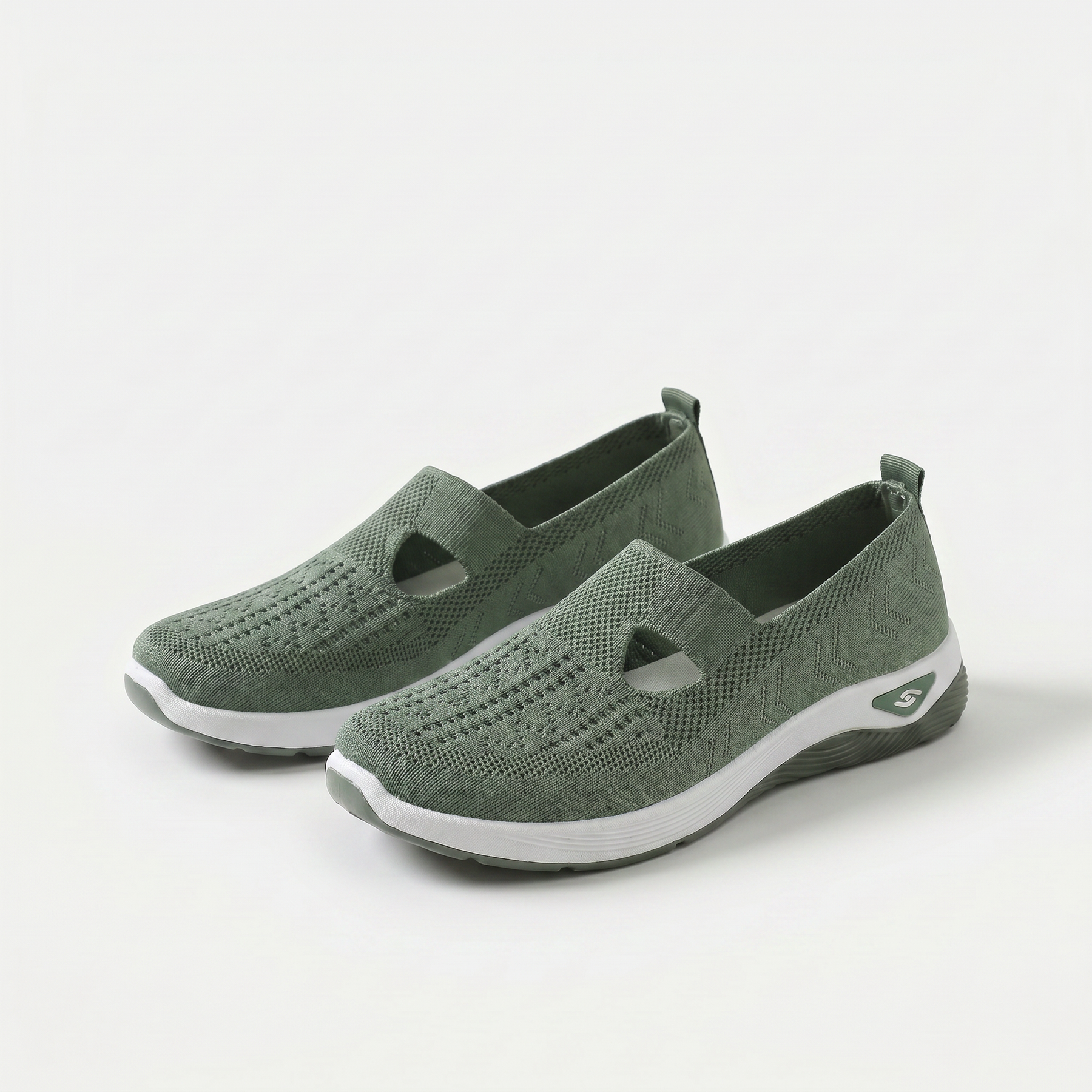 Scarpe ortopediche ammortizzanti slip-on verdi in tessuto traspirante con suola bianca