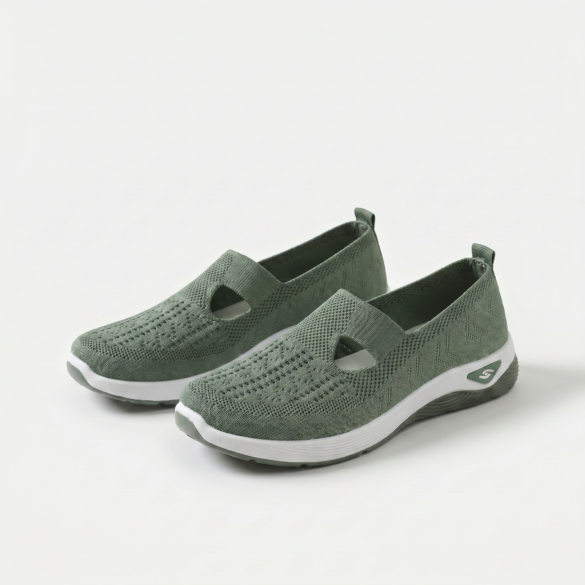 Scarpe ortopediche ammortizzanti slip-on verdi in tessuto traspirante con suola bianca