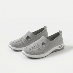 Scarpe ortopediche ammortizzanti slip-on grigie in maglia traforata con suola bianca