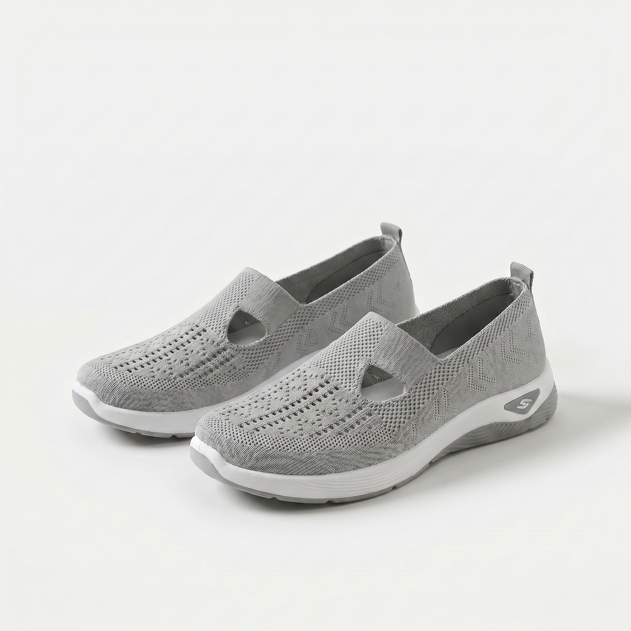 Scarpe ortopediche ammortizzanti slip-on grigie in maglia traforata con suola bianca