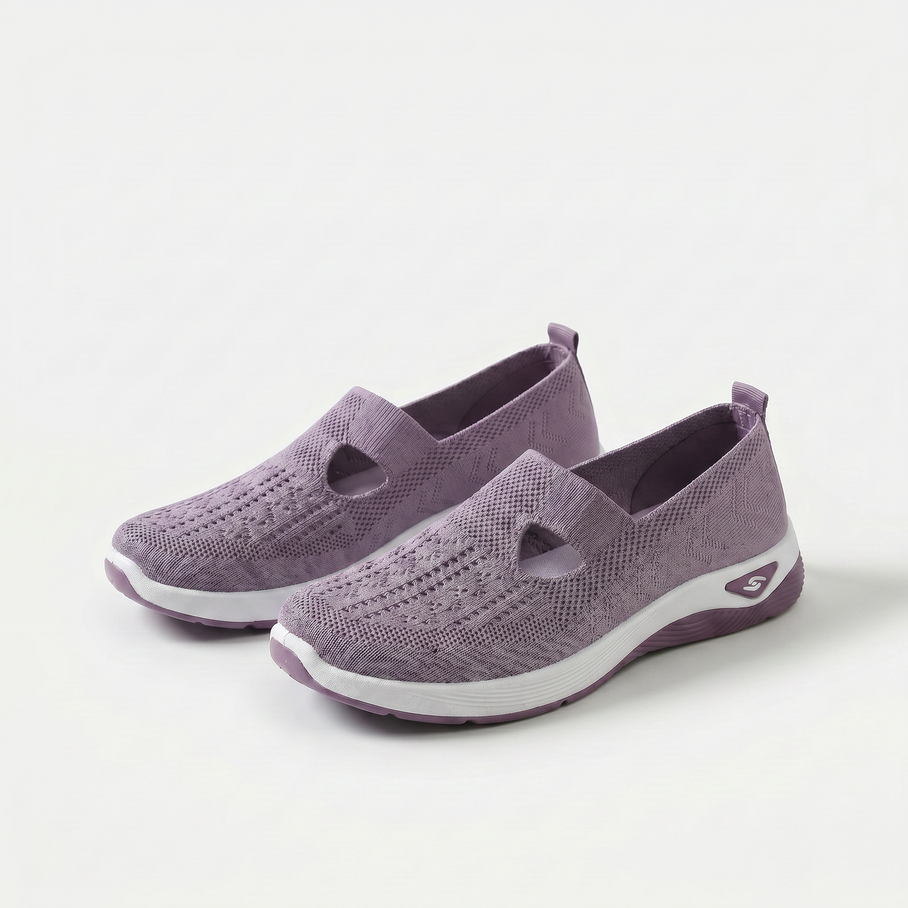 Scarpe ortopediche ammortizzanti slip-on lilla in tessuto traforato con suola bianca