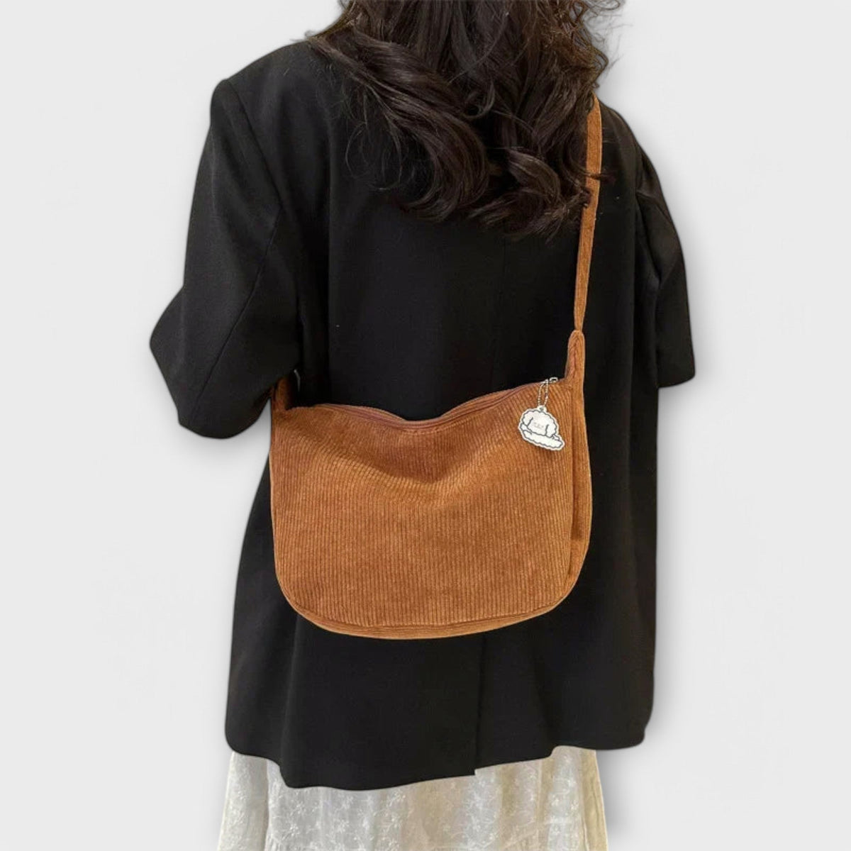 Alexa women’s shoulder bag, rust brown corduroy hobo shape with cloud charm patch