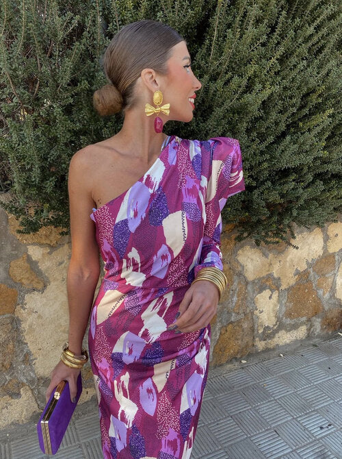 Yllana one-shoulder dress, side view with gathered drape and purple-pink abstract print