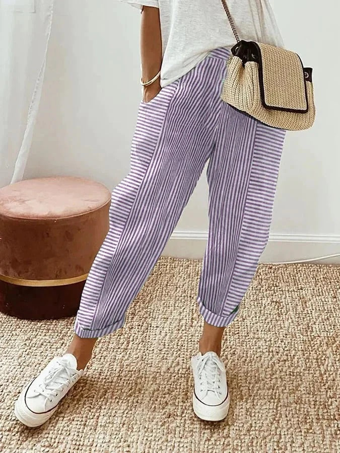 Classic striped trousers, lilac with white vertical stripes and cuffed hems