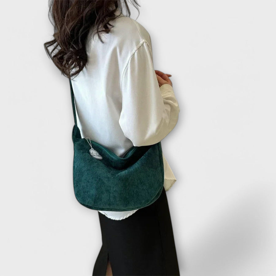 Alexa women’s shoulder bag, dark green corduroy hobo shape with cloud charm patch