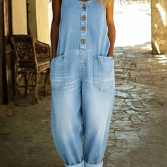 Light blue denim overalls, sleeveless button placket with chest pockets and wide legs