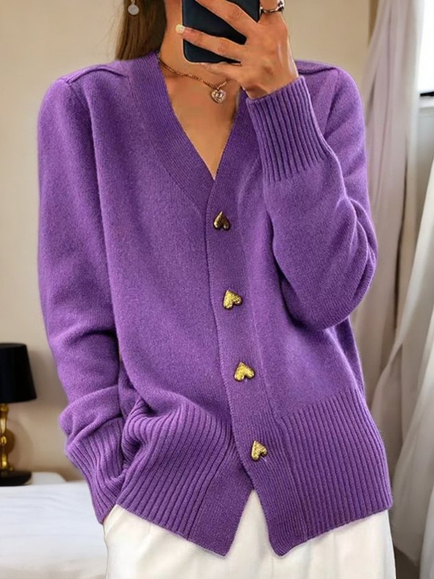 Purple knit cardigan with V-neck, ribbed cuffs, and gold button accents