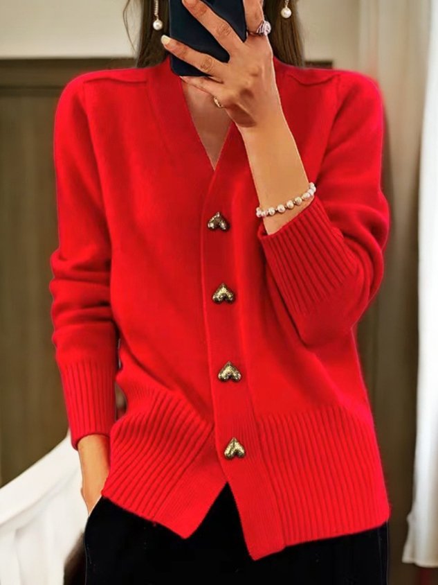 Red knit cardigan with V-neck, ribbed cuffs, and gold button accents