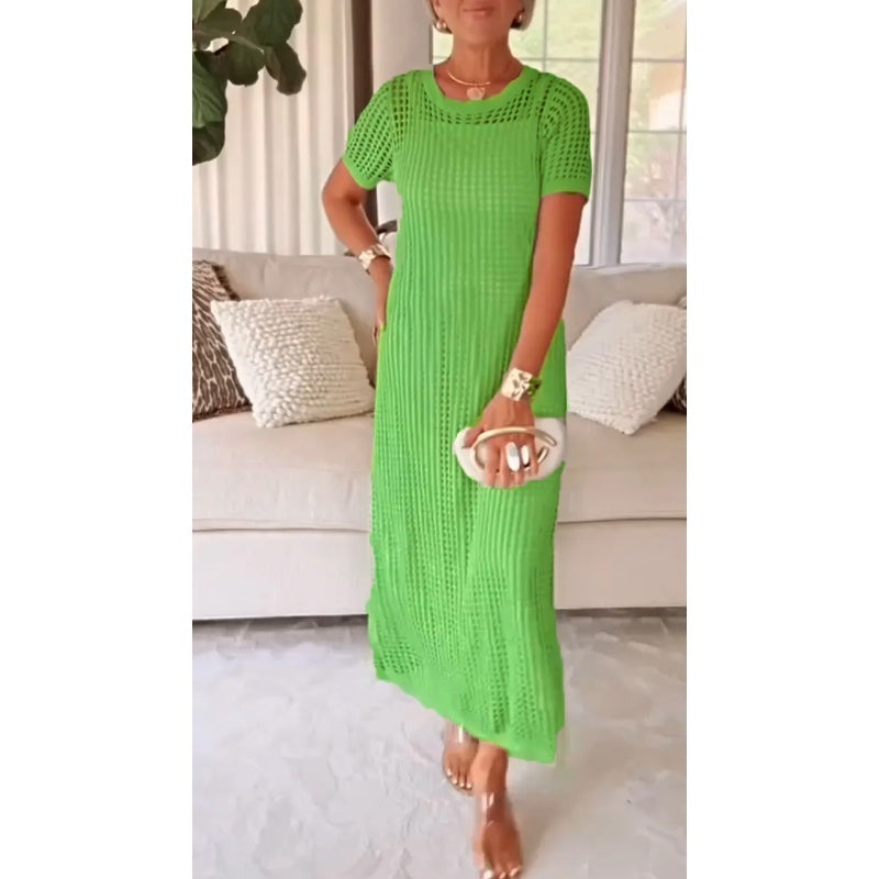 Abito lungo traforato verde con maniche corte e scollo tondo, inserti cut-out