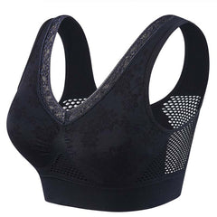 Black seamless lace support bra with wide lace straps and mesh cutout cups