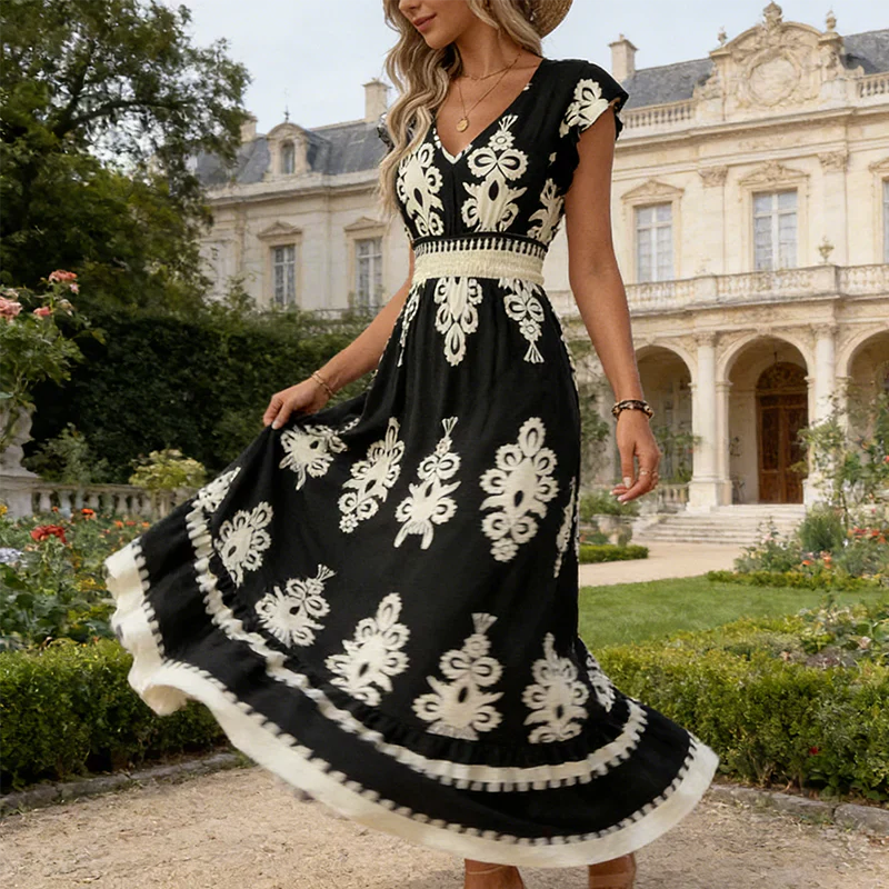 Abito maxi nero con fantasia barocca bianca, scollo a V e balze