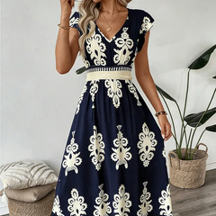 Maxi abito blu navy con stampa barocca bianca e scollo a V