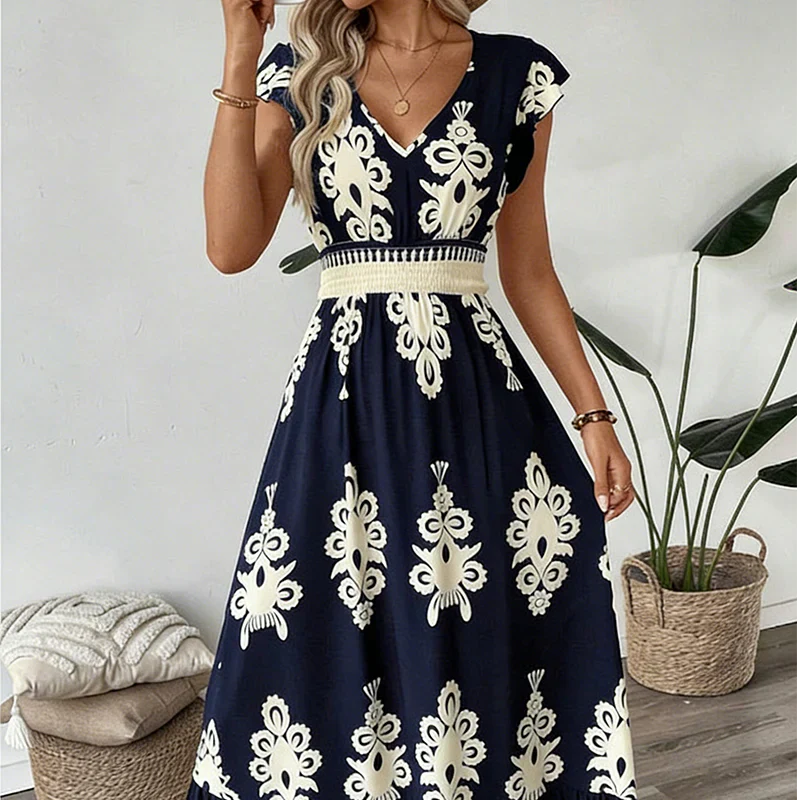 Maxi abito blu navy con stampa barocca bianca e scollo a V
