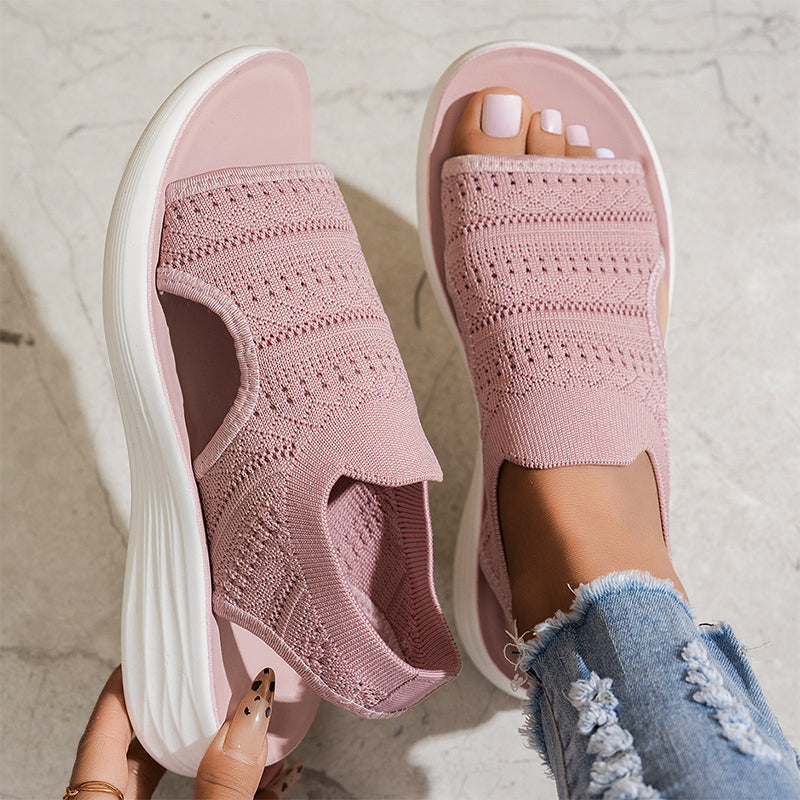 Sandali comfort rosa chiaro con tomaia in maglia traforata e suola bianca