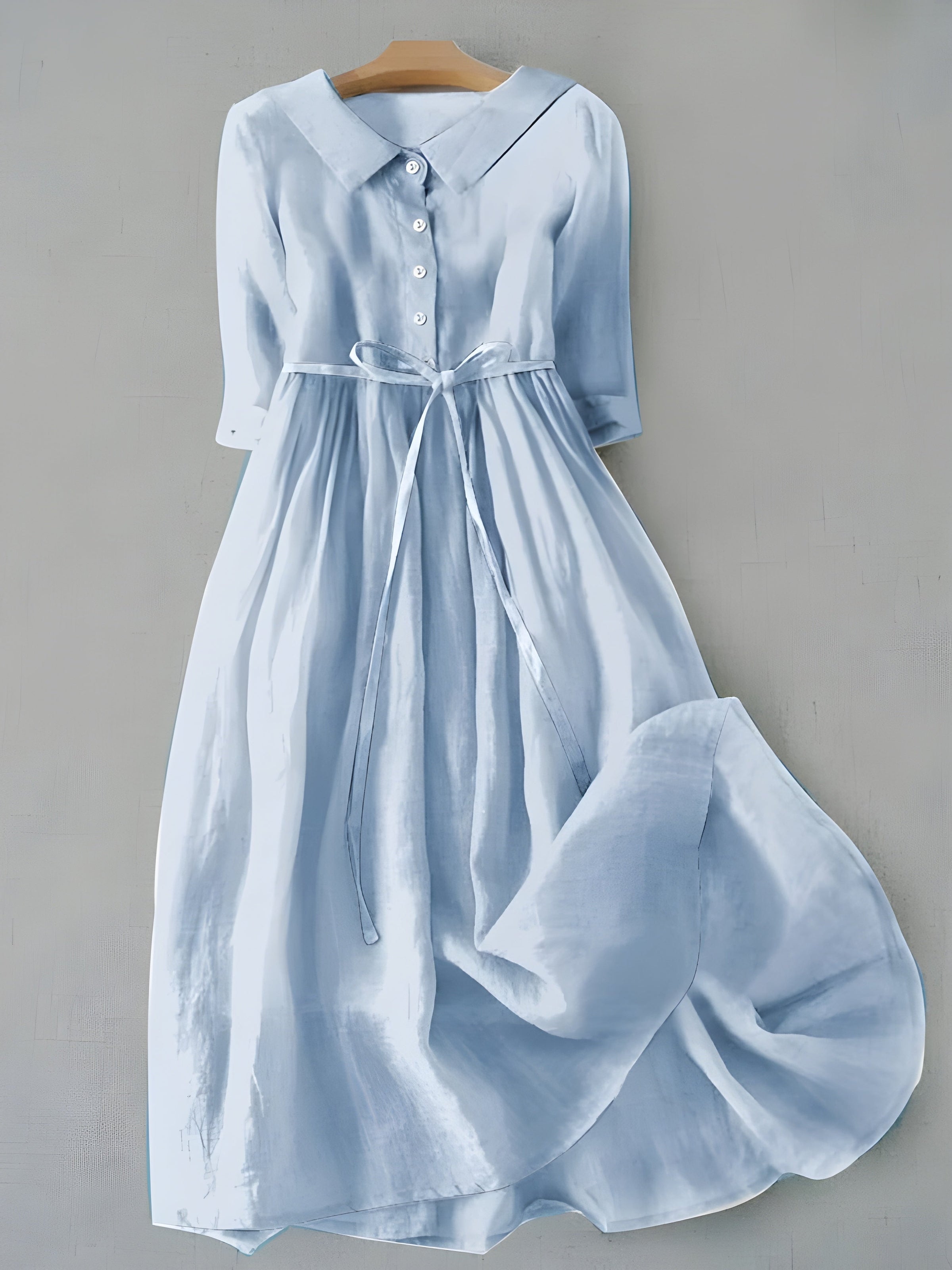 Light blue Grace dress with button front, V-neck, short sleeves, tied waist, gathered skirt