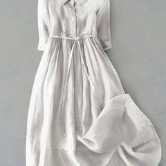 White Grace dress with button front, V-neck, short sleeves, tied waist, gathered skirt