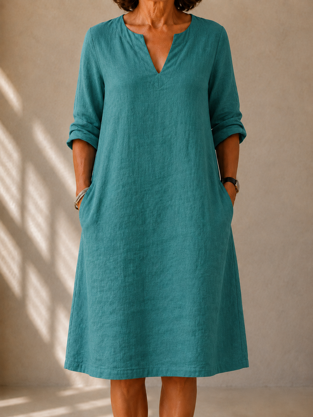 Teal classic V-neck midi dress with 3/4 sleeves and side tie pockets