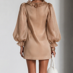 Brown satin mini dress from back view with voluminous puff sleeves