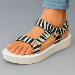 Sandali ortopedici zebra con cinturini e suola piatta bianca